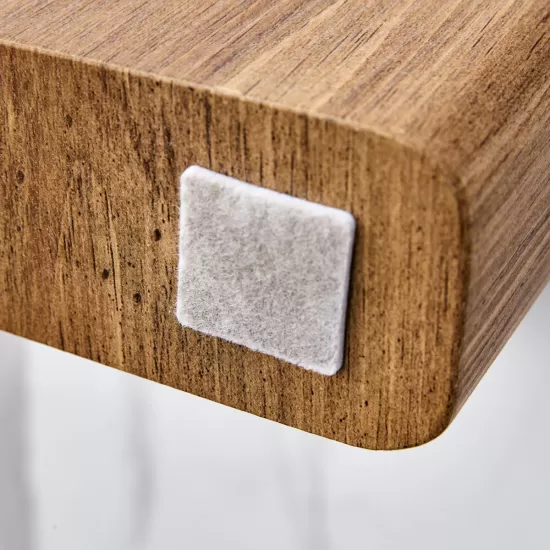 Modern practical MDF coffee table with white tabletop and wooden toned legs. Suitable for living rooms and guest rooms. Modern practical MDF coffee table with white tabletop and wooden toned legs. Suitable for living rooms and guest rooms.