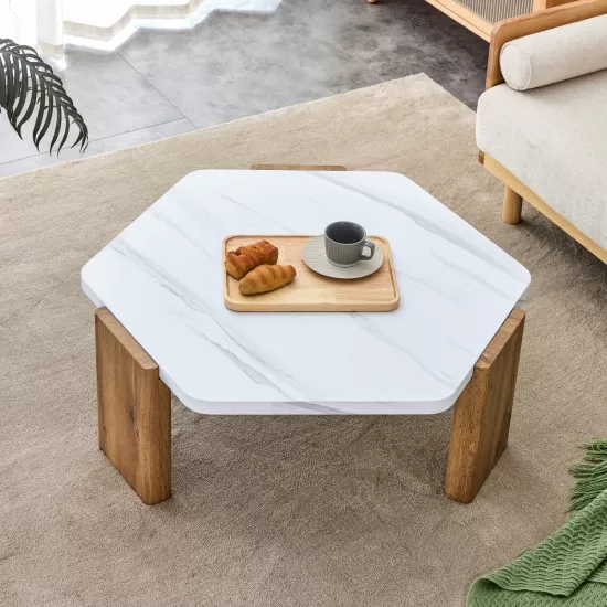 Modern practical MDF coffee table with white tabletop and wooden toned legs. Suitable for living rooms and guest rooms. Modern practical MDF coffee table with white tabletop and wooden toned legs. Suitable for living rooms and guest rooms.