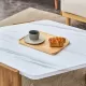 Modern practical MDF coffee table with white tabletop and wooden toned legs. Suitable for living rooms and guest rooms. Modern practical MDF coffee table with white tabletop and wooden toned legs. Suitable for living rooms and guest rooms.