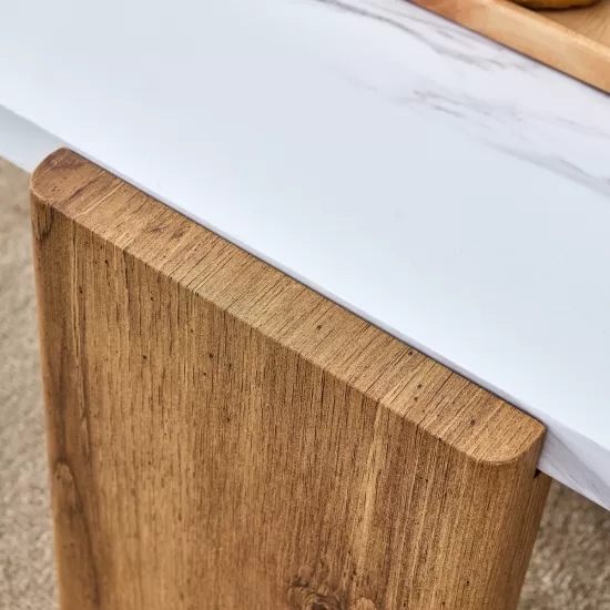 Modern practical MDF coffee table with white tabletop and wooden toned legs. Suitable for living rooms and guest rooms. Modern practical MDF coffee table with white tabletop and wooden toned legs. Suitable for living rooms and guest rooms.