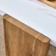 Modern practical MDF coffee table with white tabletop and wooden toned legs. Suitable for living rooms and guest rooms. Modern practical MDF coffee table with white tabletop and wooden toned legs. Suitable for living rooms and guest rooms.