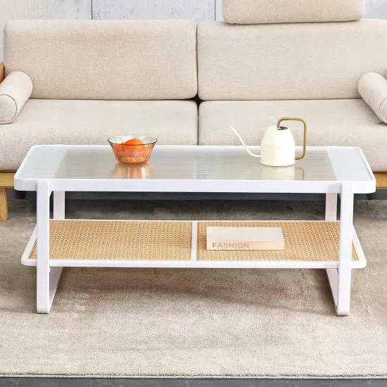 Modern minimalist white double layered solid wood coffee table. Glass tabletop, imitation rattan edge table. Rectangular table suitable for living room, dining room, and bedroom Modern minimalist white double layered solid wood coffee table. Glass tabletop, imitation rattan edge table. Rectangular table suitable for living room, dining room, and bedroom