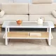 Modern minimalist white double layered solid wood coffee table. Glass tabletop, imitation rattan edge table. Rectangular table suitable for living room, dining room, and bedroom Modern minimalist white double layered solid wood coffee table. Glass tabletop, imitation rattan edge table. Rectangular table suitable for living room, dining room, and bedroom